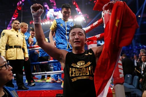 Zou Shiming conquistó título internacional mosca OMB