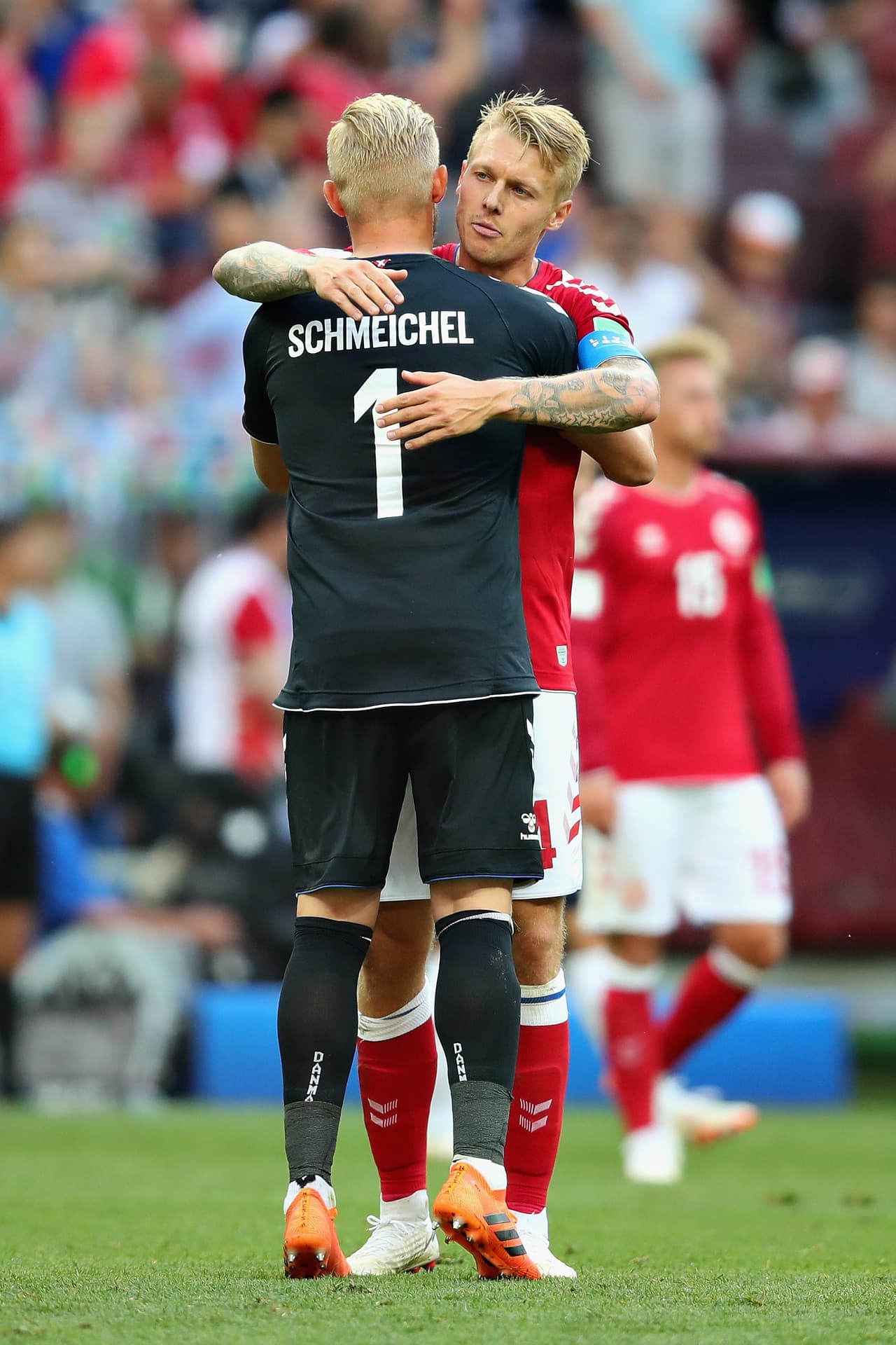 MOSCOW, RUSSIA - JUNE 26: Kasper Schmeichel of Denmark hugs teammate Simon Kjaer after the 2018 FIFA World Cup Russia group C match between Denmark and France at Luzhniki Stadium on June 26, 2018 in Moscow, Russia. (Photo by Chris Brunskill/Fantasista/Getty Images)