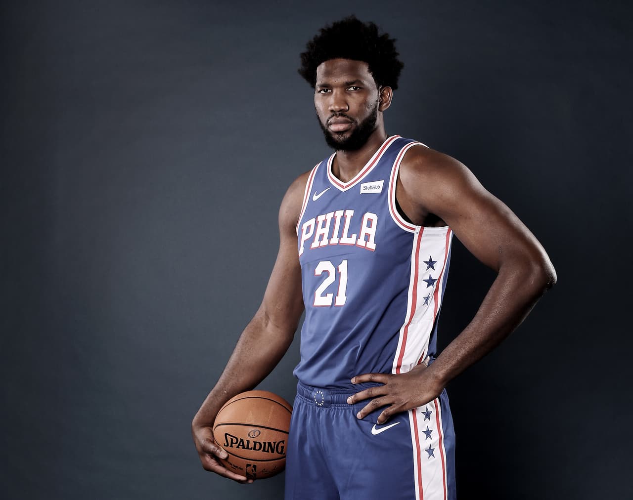 CAMDEN, NEW JERSEY - SEPTEMBER 30: (EDITORS NOTE: Image has been desaturated.) Joel Embiid #21 of the Philadelphia 76ers poses for a portrait during Media Day at 76ers Training Complex on September 30, 2019 in Camden, New Jersey.NOTE TO USER: User expressly acknowledges and agrees that, by downloading and/or using this photograph, user is consenting to the terms and conditions of the Getty Images License Agreement. (Photo by Elsa/Getty Images)