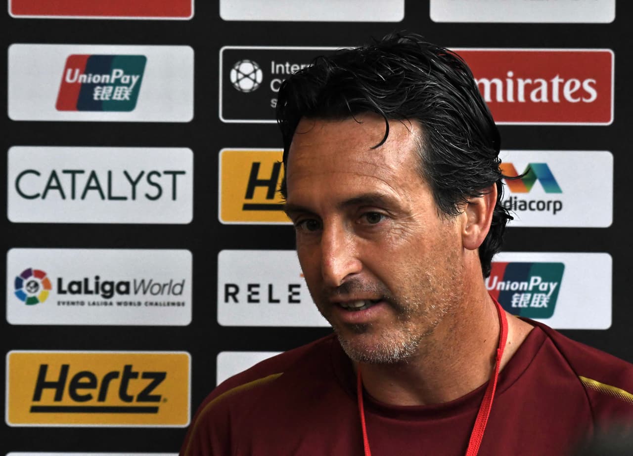 Arsenal manager Unai Emery speaks to reporters during an interview following the team training session for the International Champions Cup match in Singapore on July 25, 2018. (Photo by Roslan RAHMAN / AFP) (Photo credit should read ROSLAN RAHMAN/AFP/Getty Images)