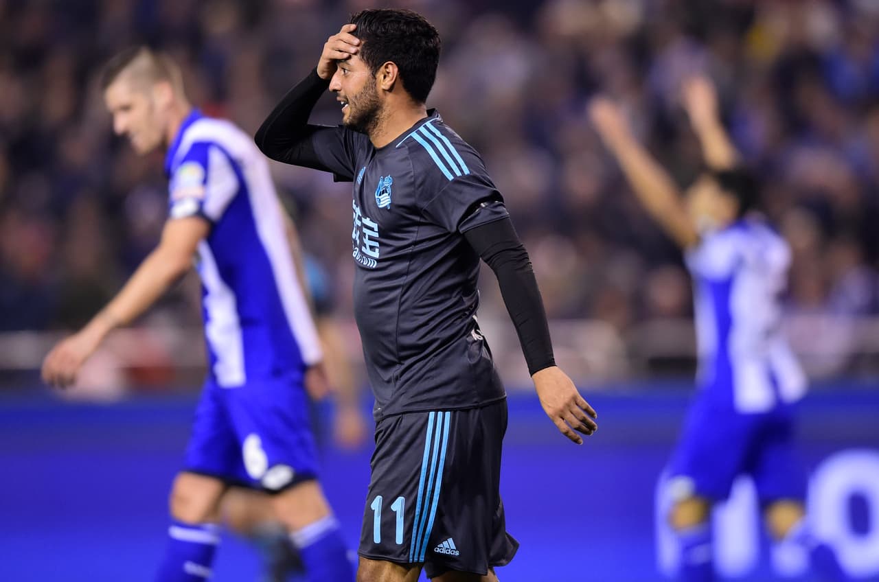 Real Sociedad's Mexican forward Carlos Vela gestures during the Spanish league football match RC Deportivo de la Coruna vs Real Sociedad at the Municipal de Riazor stadium in La Coruna on December 5, 2016. / AFP / MIGUEL RIOPA (Photo credit should read MIGUEL RIOPA/AFP/Getty Images)