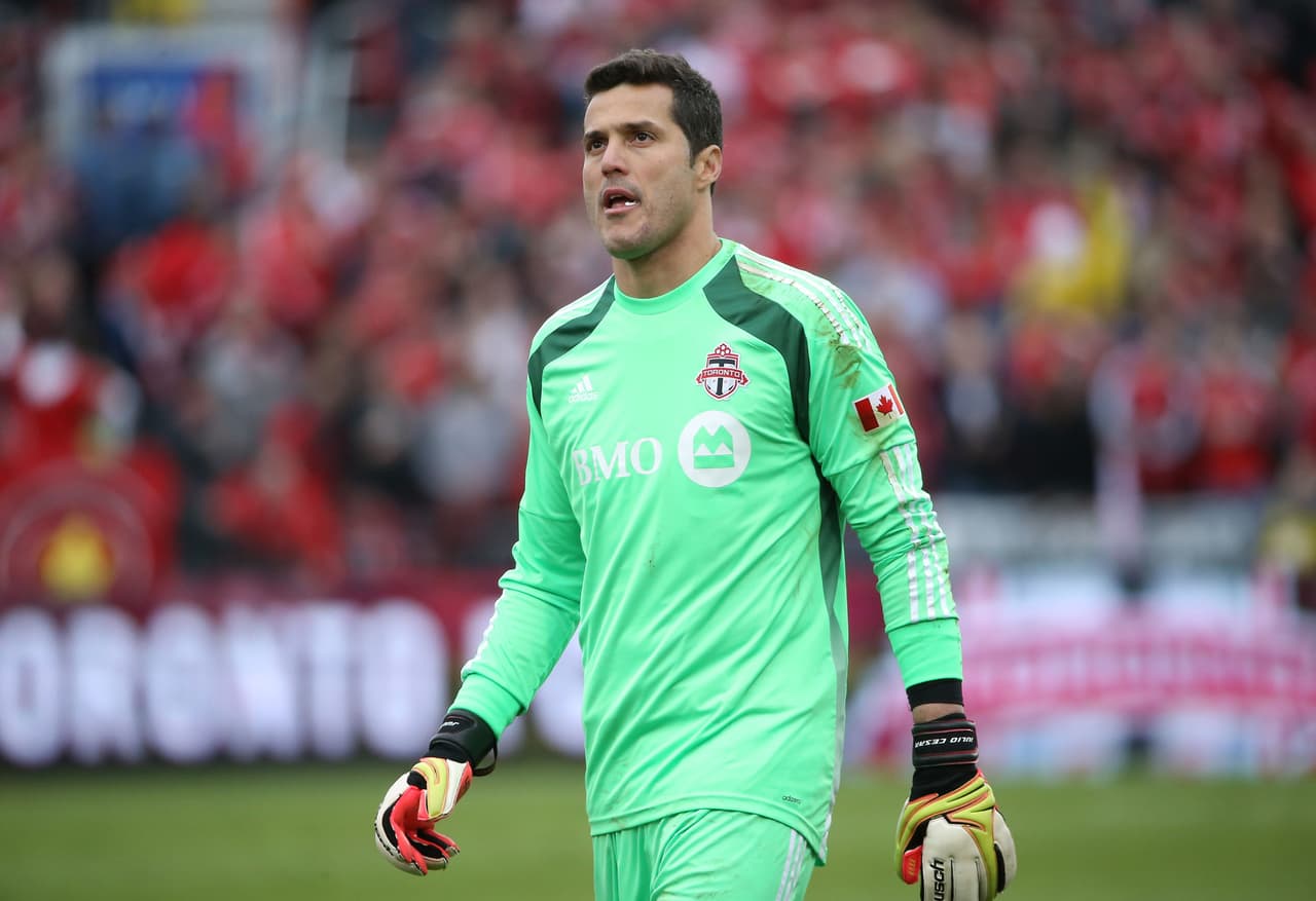 Apr 12, 2014; Toronto, Ontario, CAN; Toronto FC goalkeeper Julio Cesar (30) during their match against the Colorado Rapids at BMO Field. The Rapids beat the FC 1-0. Mandatory Credit: Tom Szczerbowski-USA TODAY Sports