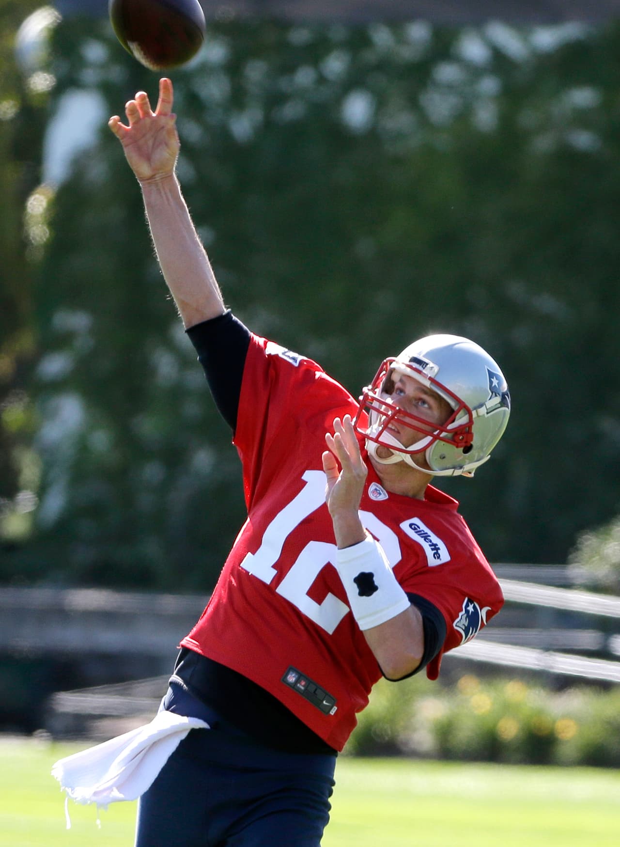 New England Patriots quarterback Tom Brady (12) delivers a pass during an NFL football team practice Wednesday, Oct. 5, 2016, in Foxborough, Mass. (AP Photo/Steven Senne)