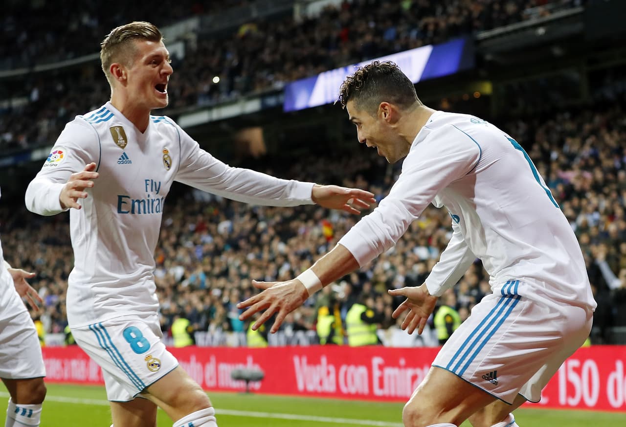 Festejo de 2018, cuando Kroos y Cristiano compartían vestuario en el cuadro merengue.
<br>