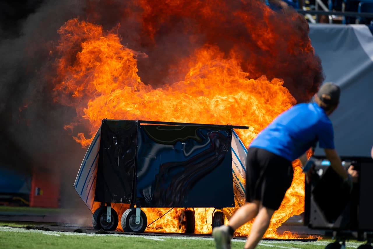 NASHVILLE, TN - SEPTEMBER 15: A failed pyrotechnic device bursts into flames before the game between the Tennessee Titans and the Indianapolis Colts at Nissan Stadium on September 15, 2019 in Nashville, Tennessee. (Photo by Brett Carlsen/Getty Images)