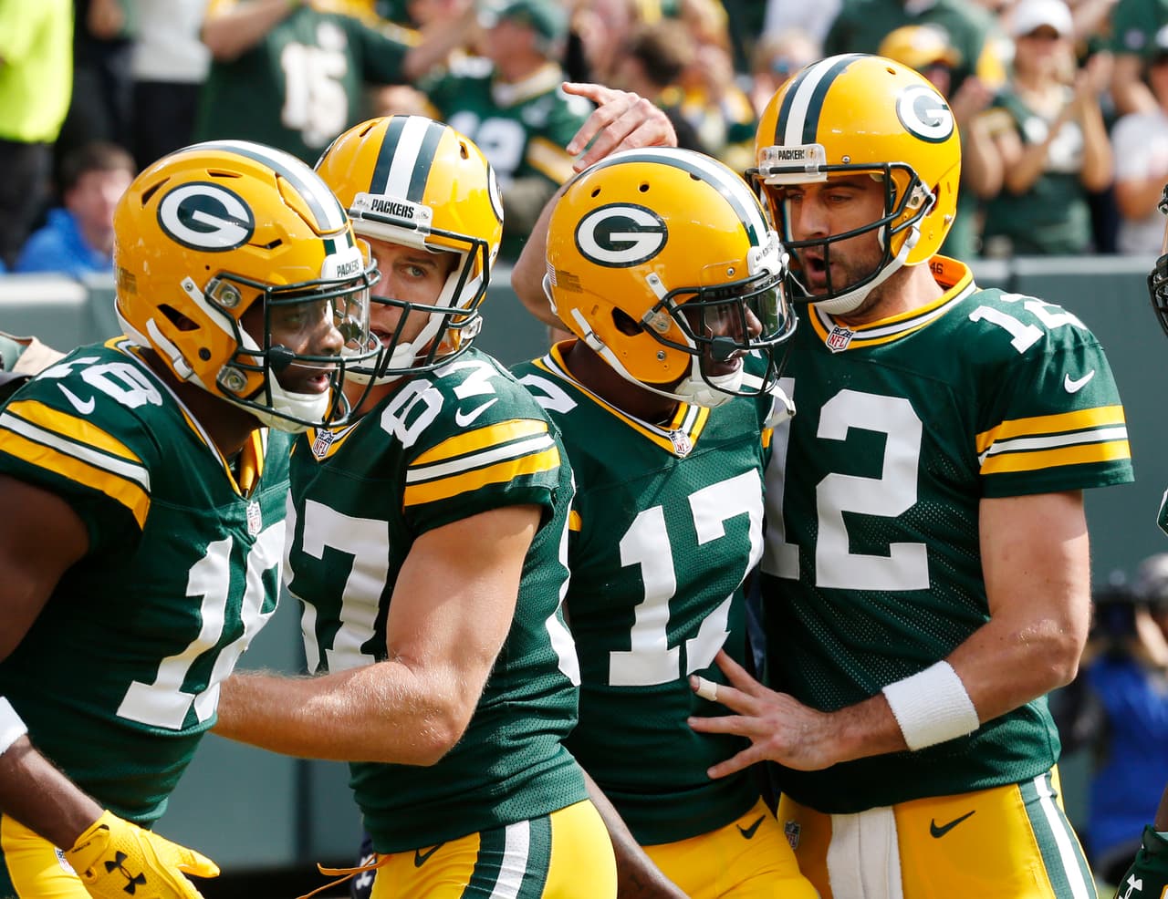 Green Bay se impuso 34-27 a Detroit con cuatro pases de anotación de Aaron Rodgers
