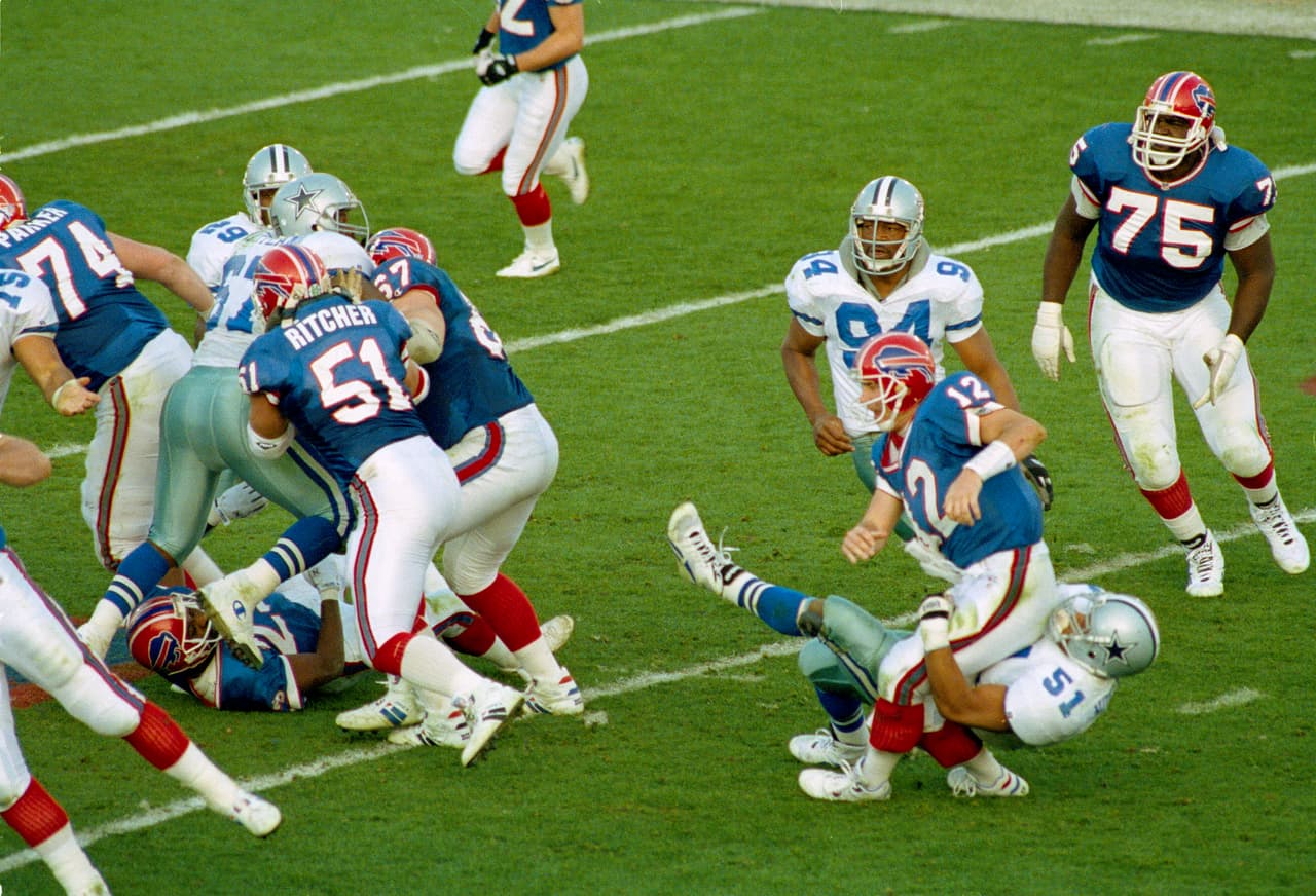 Super Bowl XXVII (Buffalo Bills 17-52 Dallas Cowboys) | El SB se jugó en el Rosebowl en Pasadena. MVP: Troy Aikman (QB Dallas). Comercial de 30 segundos: 850 mil dólares por la NBC.