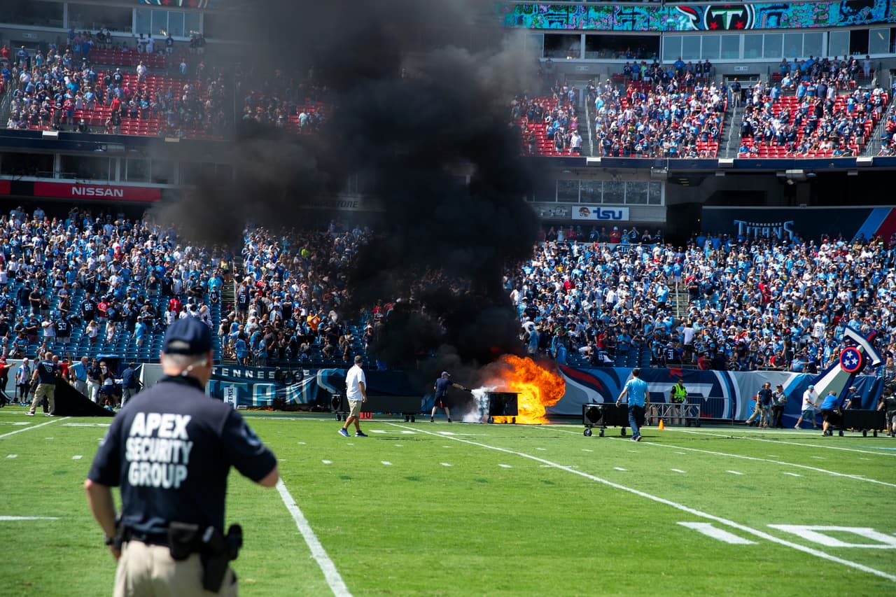 NASHVILLE, TN - SEPTEMBER 15: A failed pyrotechnic device bursts into flames before the game between the Tennessee Titans and the Indianapolis Colts at Nissan Stadium on September 15, 2019 in Nashville, Tennessee. (Photo by Brett Carlsen/Getty Images)