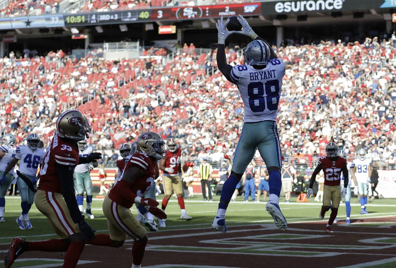 Dez Bryant puso la cifra definitiva para su equipo, con el 40-3 parcial en el último cuarto.
