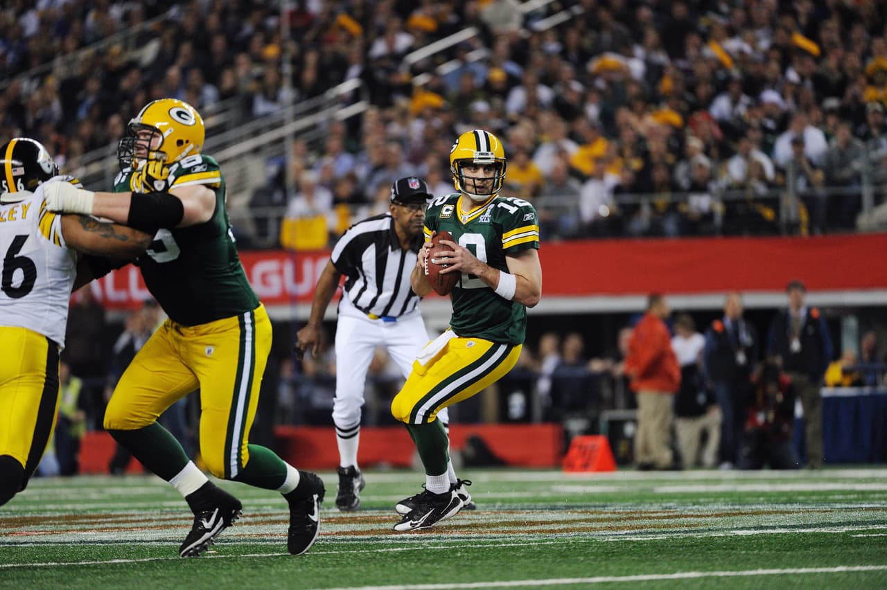 AARON RODGERS - Super Bowl XLV Primera selección de los Packers en 2005 tuvo que esperar varios años como suplente de Brett Favre. En 2008 se convierte en titular y le toma 3 años bajo el mando de Mike McCarthy alcanzar el campeonato.