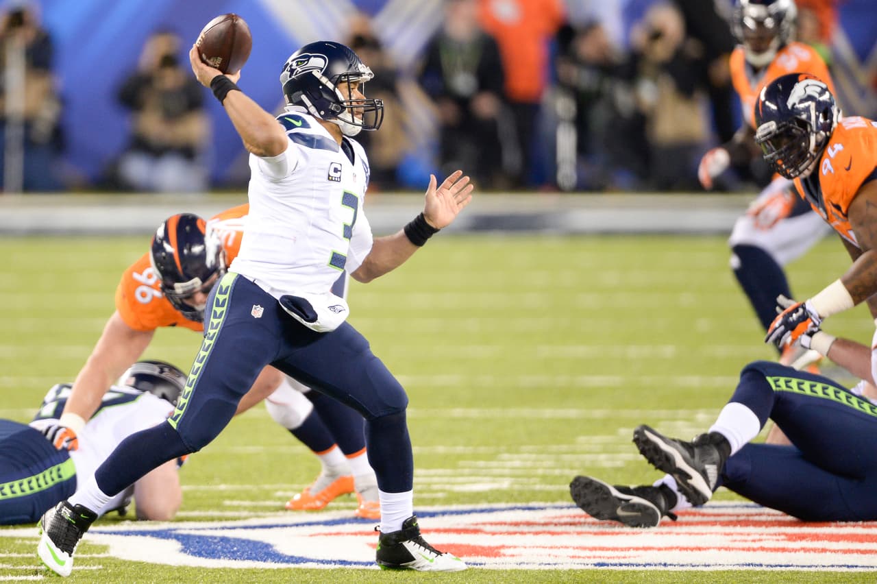 RUSSELL WILSON - Super Bowl XLVIII Casi ignorado en el Draft, tomado hasta la 3a. Ronda, Pick 75 para los Seattle Seahawks en el Draft de 2012. Resultó en un elemento disciplinado al sistema de Pete Carroll, ejecutar sin errores, tuvo resultados rápidos, campeón apenas en su segundo año como profesional.