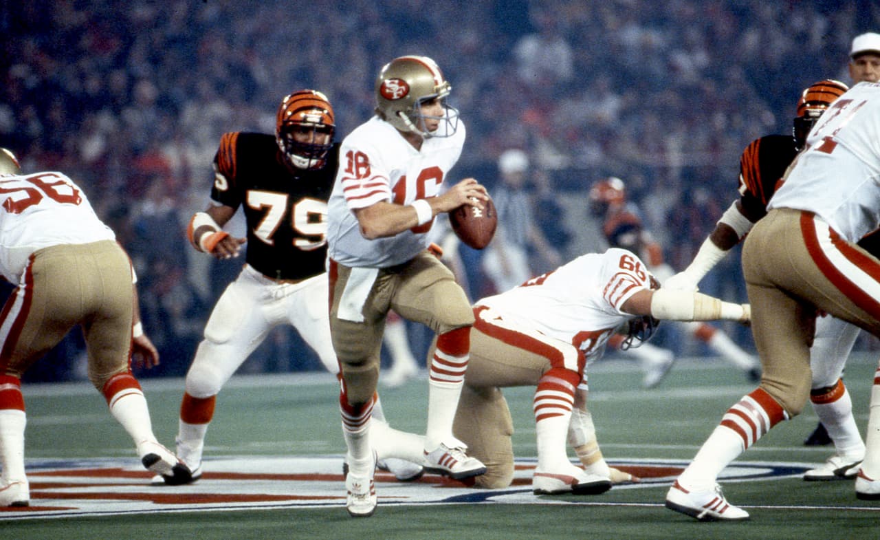 JOE MONTANA - Super Bowl XVI, XIX, XXIII y XXIV Llegó a los 49ers en 1979, primer año del coach Bill Walsh, ambos revolucionaron el juego. Dos talentos semejantes tardaron relativamente poco tiempo, solo 3 años para alcanzar el primer título.