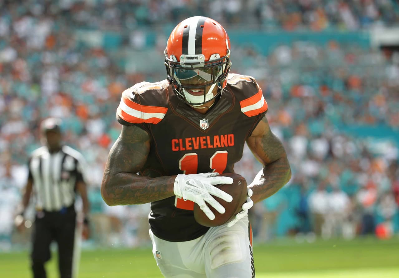 Cleveland Browns wide receiver Terrelle Pryor (11) runs for a touchdown during the second half of an NFL football game against the Miami Dolphins, Sunday, Sept. 25, 2016, in Miami Gardens, Fla. (AP Photo/Lynne Sladky)