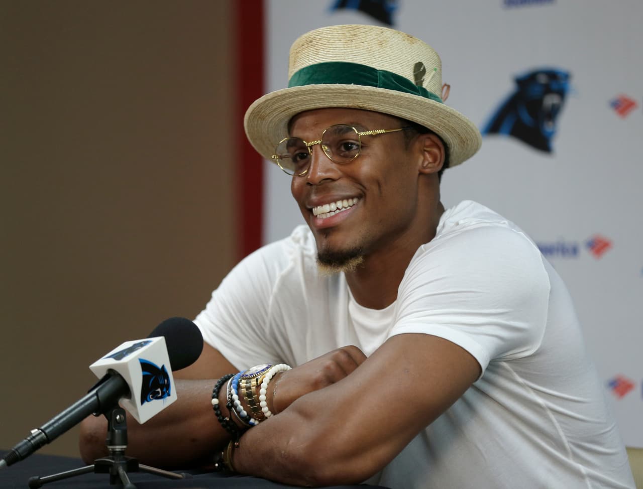 Carolina Panthers' Cam Newton answers a question during a news conference before practice at the NFL team's football training camp at Wofford College in Spartanburg, S.C., Thursday, July 27, 2017. (AP Photo/Chuck Burton)