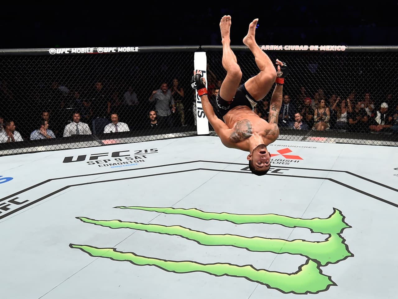 MEXICO CITY, MEXICO - AUGUST 05: Sergio Pettis does a backflip in the Octagon after facing Brandon Moreno of Mexico in their flyweight bout during the UFC Fight Night event at Arena Ciudad de Mexico on August 5, 2017 in Mexico City, Mexico. (Photo by Jeff Bottari/Zuffa LLC/Zuffa LLC via Getty Images)