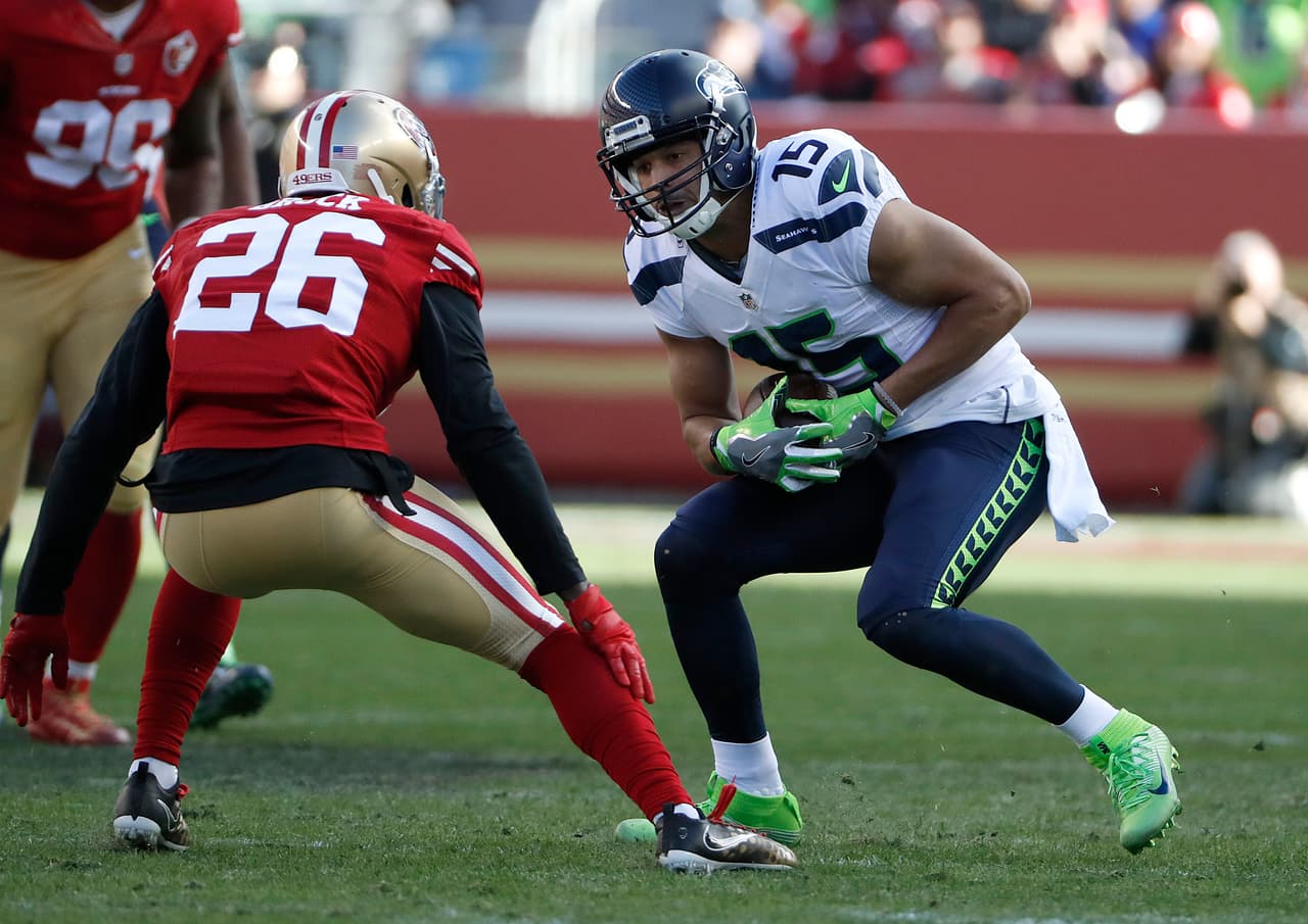 Seattle Seahawks wide receiver Jermaine Kearse (15) runs against San Francisco 49ers cornerback Tramaine Brock (26) during the first half of an NFL football game in Santa Clara, Calif., Sunday, Jan. 1, 2017. (AP Photo/Tony Avelar)