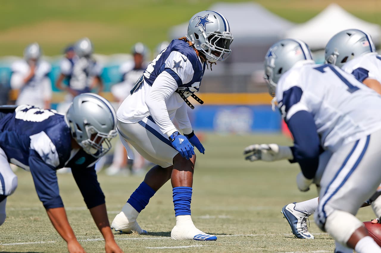 Dallas Cowboys linebacker Jaylon Smith crouches in position during an NFL training camp, Thursday, August 10, 2017 in Oxnard, California. (James D Smith via AP)