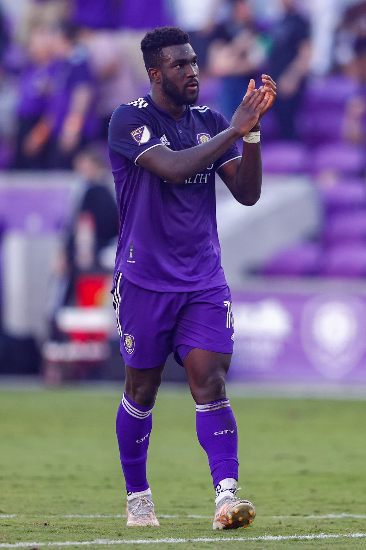 Oct 31, 2021; Orlando, Florida, USA; Orlando City forward Daryl Dike (18) reacts to the fans after a draw with Nashville SC 1-1 at Orlando City Stadium. Mandatory Credit: Nathan Ray Seebeck-USA TODAY Sports