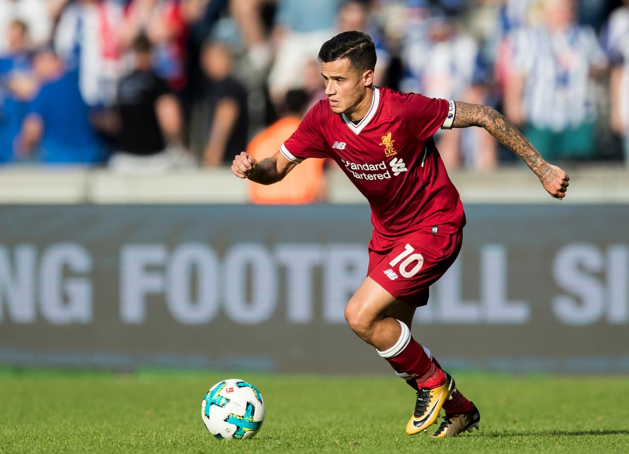 BERLIN, GERMANY - JULY 29: Philippe Coutinho of Liverpool FC runs with the ball during the Preseason Friendly match between Hertha BSC and FC Liverpool at Olympiastadion on July 29, 2017 in Berlin, Germany. (Photo by Boris Streubel/Getty Images)