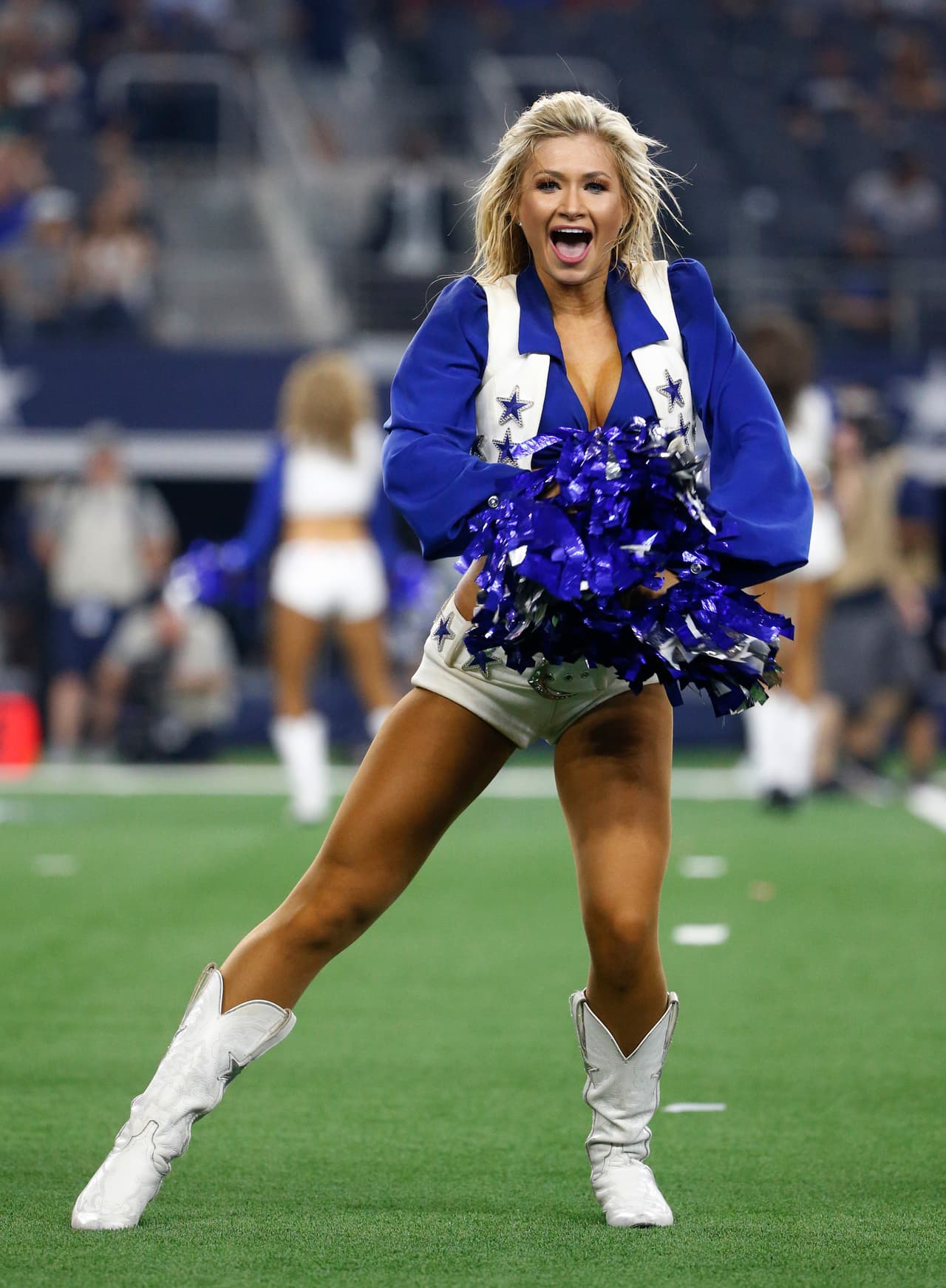Dallas Cowboys cheerleaders perform during the second half of a preseason NFL football game against the Arizona Cardinals in Arlington, Texas, Sunday, Aug. 26, 2018. (AP Photo/Michael Ainsworth)