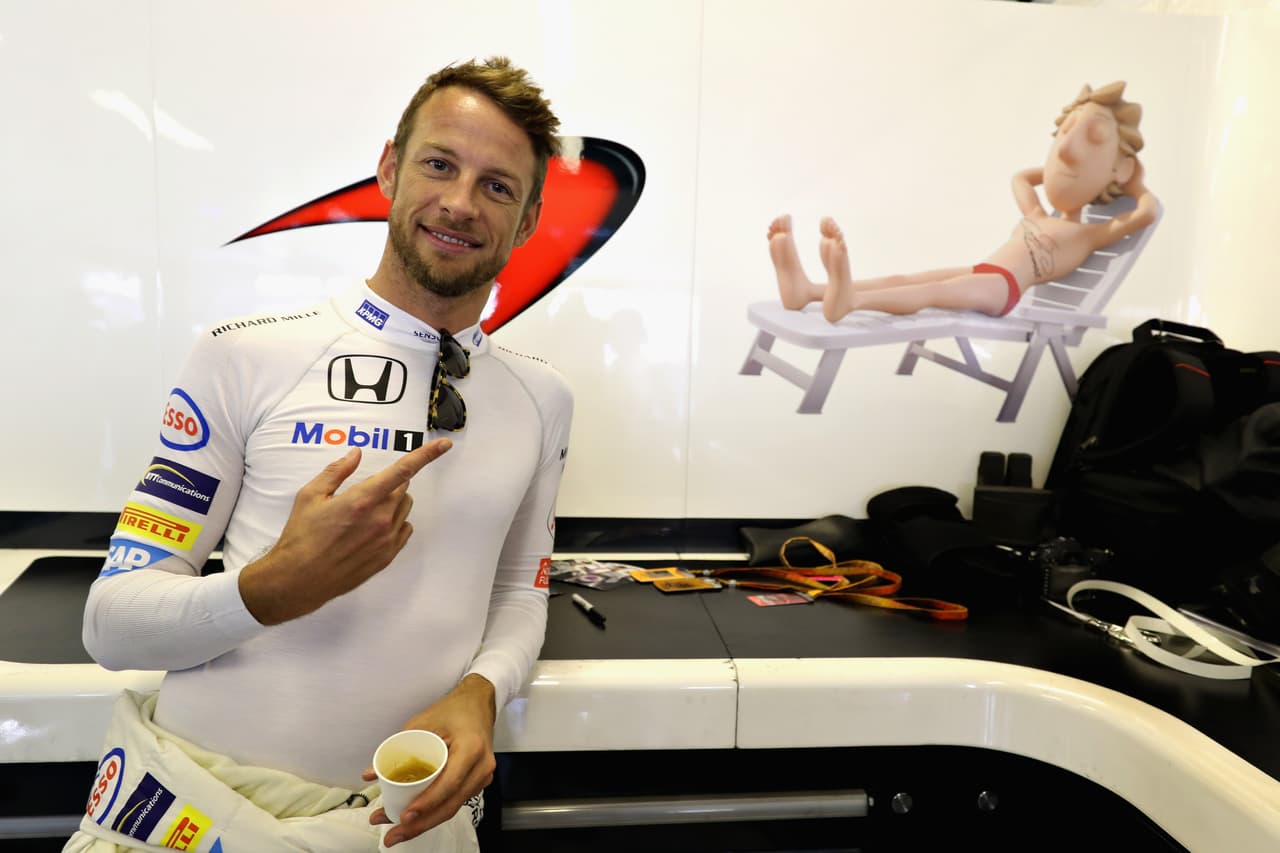 ABU DHABI, UNITED ARAB EMIRATES - NOVEMBER 27: Jenson Button of Great Britain and McLaren Honda in the garage before the Abu Dhabi Formula One Grand Prix at Yas Marina Circuit on November 27, 2016 in Abu Dhabi, United Arab Emirates. (Photo by Mark Thompson/Getty Images)