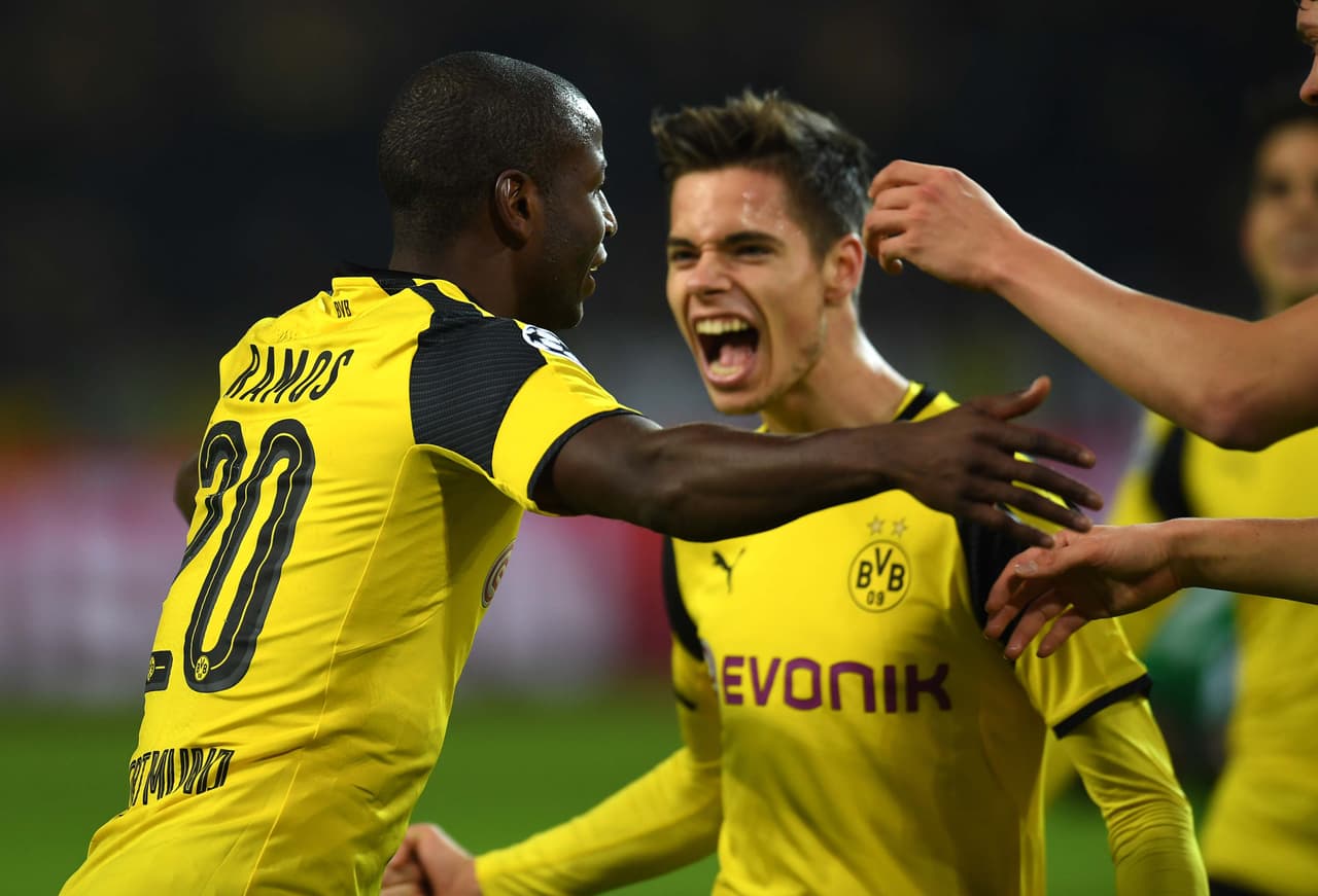 Dortmund's Columbian striker Adrian Ramos (L) celebrates scoring with team mates during the UEFA Champions League Group F football match between BVB Borussia Dortmund and Sporting CP in Dortmund, western Germany, on November 2, 2016. / AFP / PATRIK STOLLARZ (Photo credit should read PATRIK STOLLARZ/AFP/Getty Images)