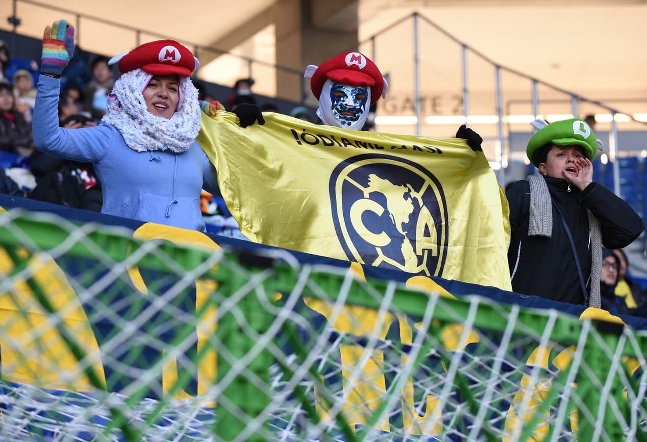 Supporters of Club America cheer during the Club World Cup football match between Jeonbuk Hyundai and Club America in Osaka on December 11, 2016. / AFP / TORU YAMANAKA (Photo credit should read TORU YAMANAKA/AFP/Getty Images)