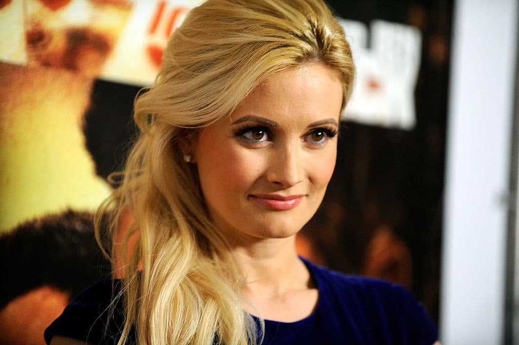 "Tuve otra relación como la de Hef, sólo que con una persona más joven y sin la situación de tipo secta que la rodea", declaró Holly.