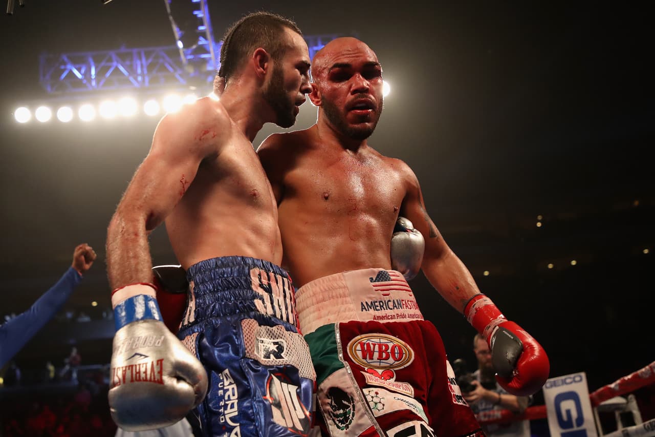 GLENDALE, AZ - AUGUST 25: Jose Pedraza (L) of Puerto Rico hugs Raymundo Beltran following the WBO lightweight championship bout at Gila River Arena on August 25, 2018 in Glendale, Arizona. (Photo by Christian Petersen/Getty Images)