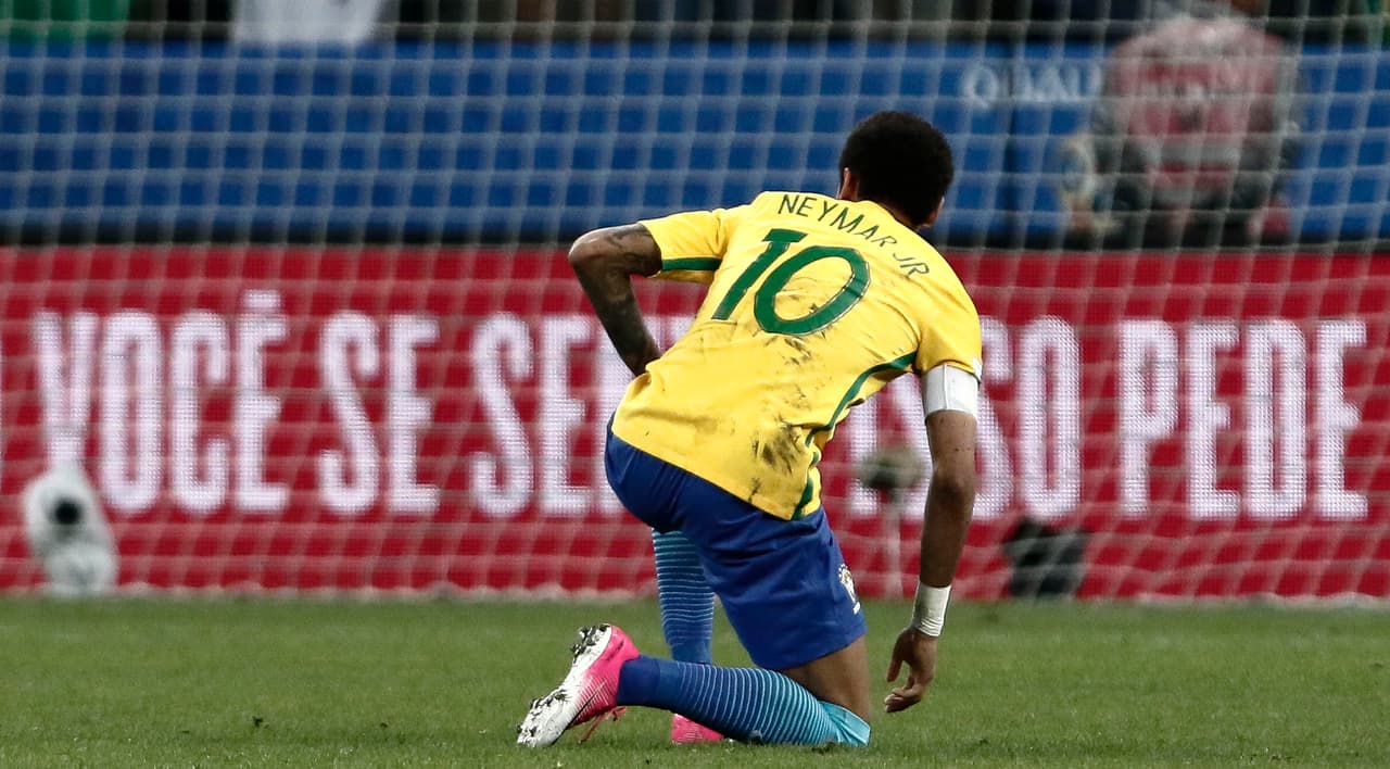 Brazil's forward Neymar is seen during their 2018 FIFA World Cup qualifier football match against Paraguay in Sao Paulo, Brazil on March 28, 2017. / AFP PHOTO / Miguel SCHINCARIOL (Photo credit should read MIGUEL SCHINCARIOL/AFP/Getty Images)