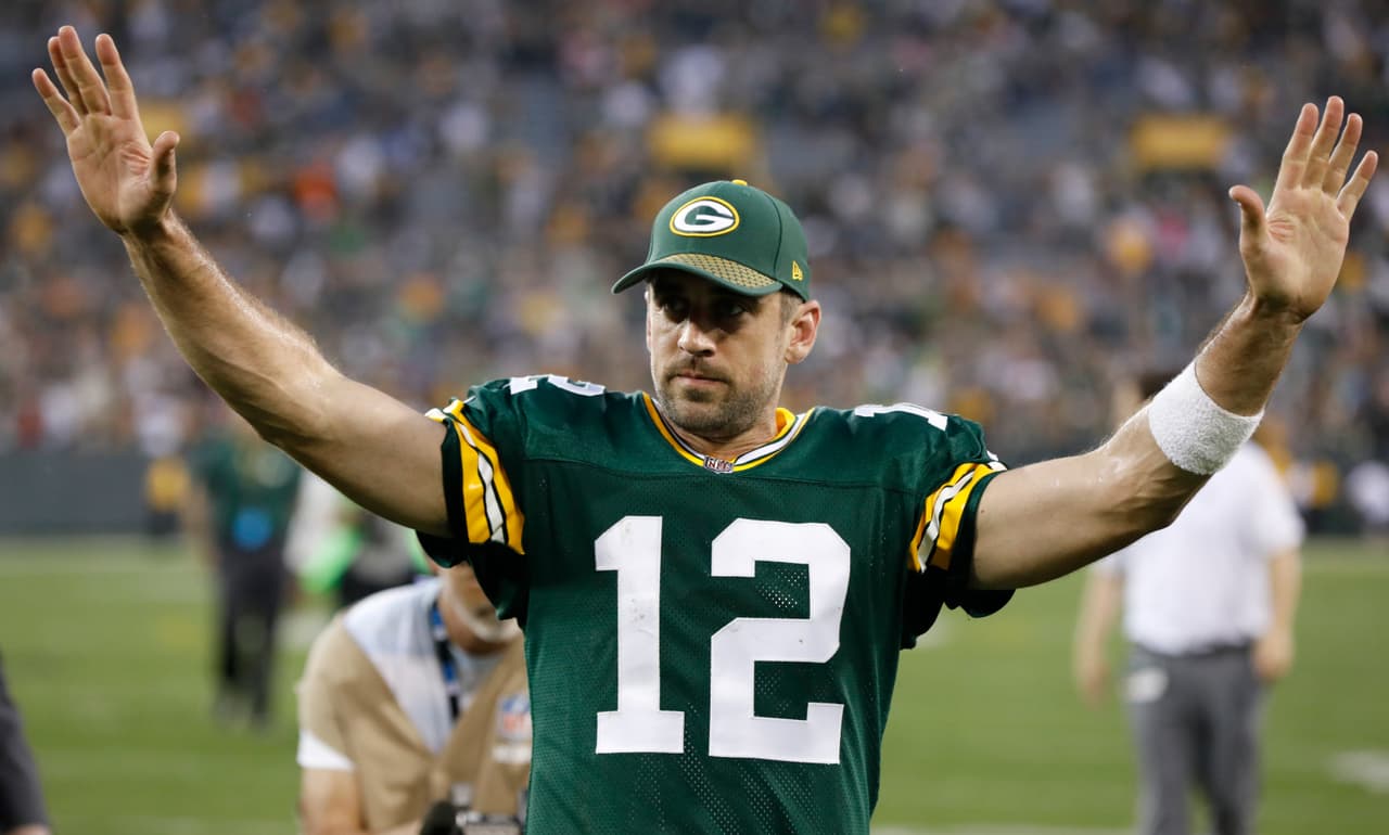 Green Bay Packers' Aaron Rodgers celebrates after an NFL football game against the Cincinnati Bengals Sunday, Sept. 24, 2017, in Green Bay, Wis. The Packers won 27-24 in overtime. (AP Photo/Mike Roemer)
