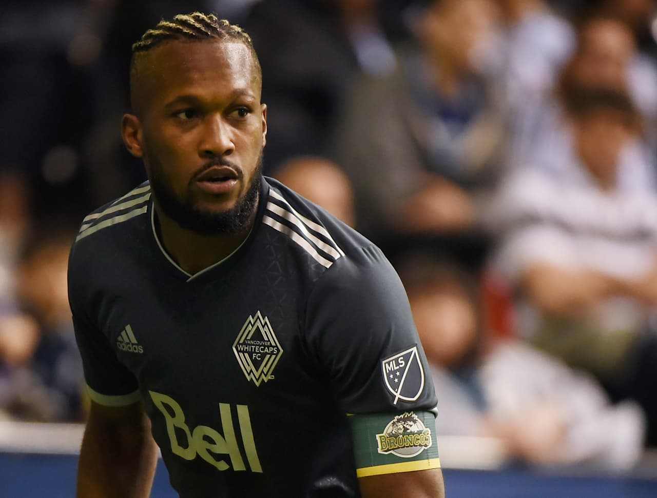 Apr 13, 2018; Vancouver, British Columbia, CAN; Vancouver Whitecaps defender Kendall Waston (4) wears a Humboldt Strong arm band during the second half against the Los Angeles FC at BC Place. Mandatory Credit: Anne-Marie Sorvin-USA TODAY Sports