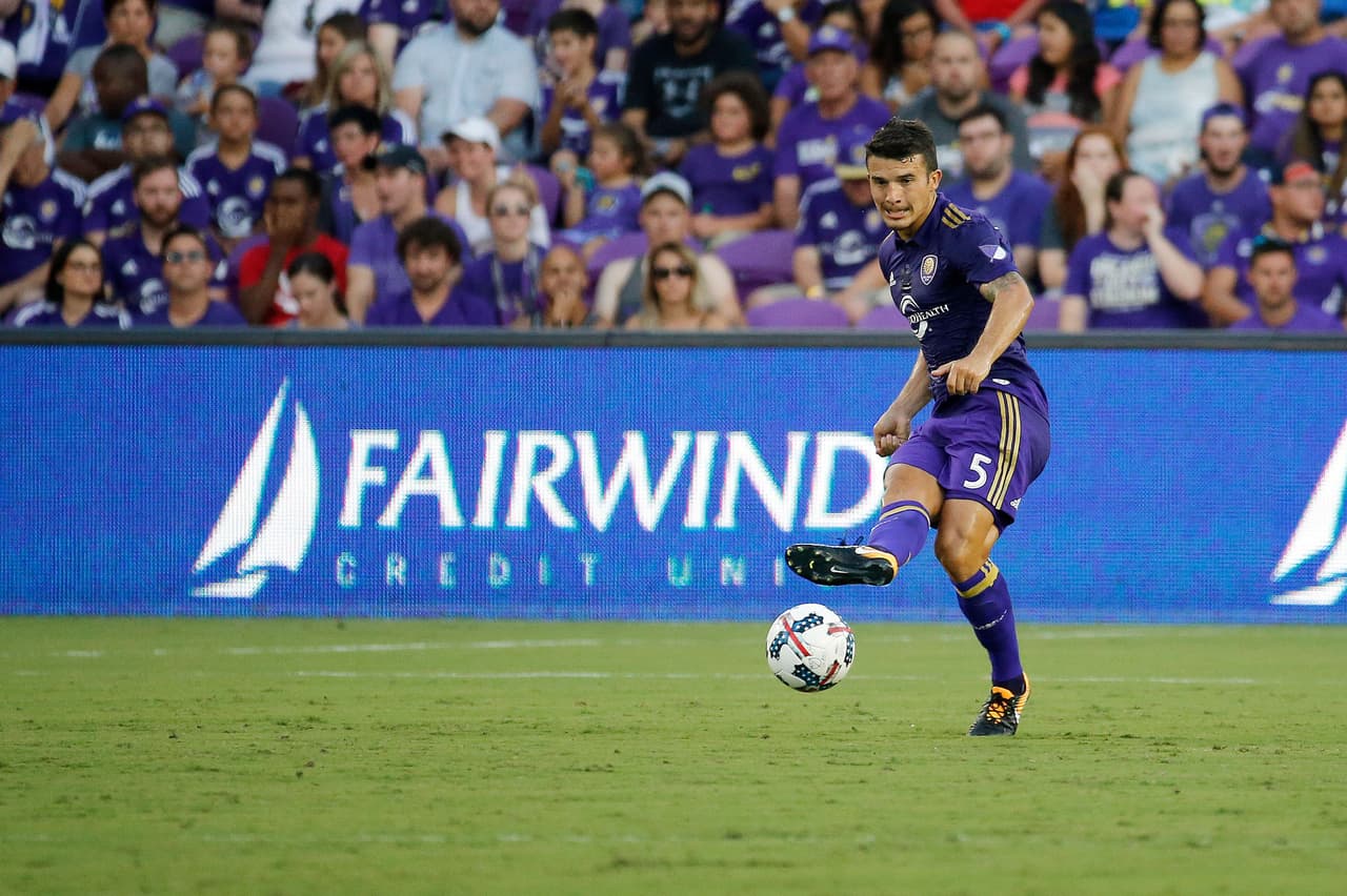 Jul 5, 2017; Orlando, FL, USA; Orlando City SC midfielder Servando Carrasco (5) passes the ball against the Toronto FC during the first half at Orlando City Stadium. Mandatory Credit: Kim Klement-USA TODAY Sports