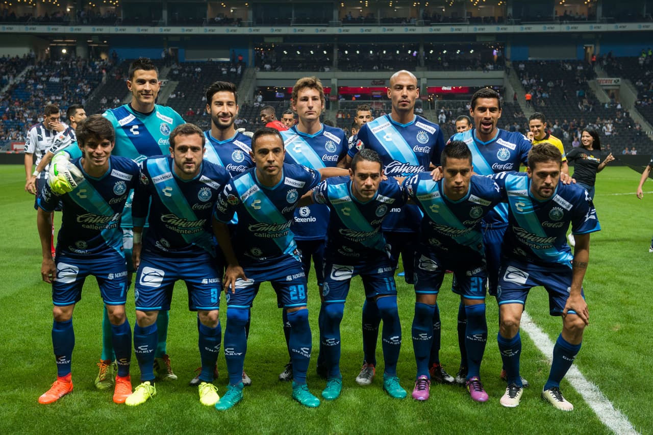 El once de Puebla: Villaseñor; Centurión, Cortés, Rojas, Orrantía; Schmidt, Araújo, Torres, González; Amione, Pérez Reyes.