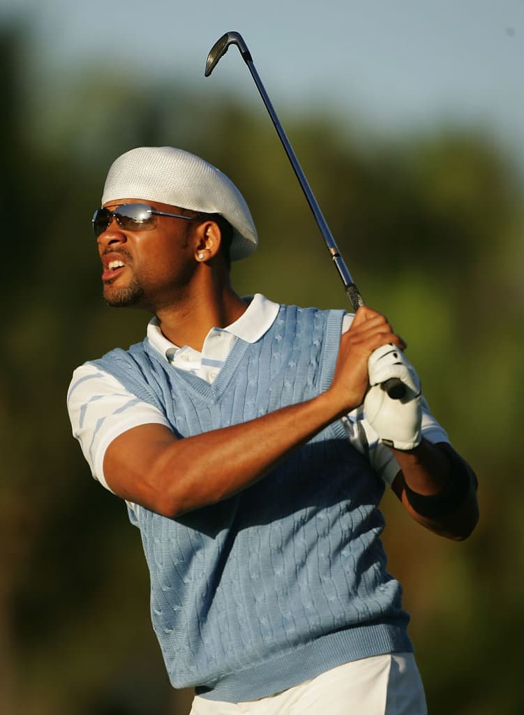 Will Smith juega golf junto con su familia.