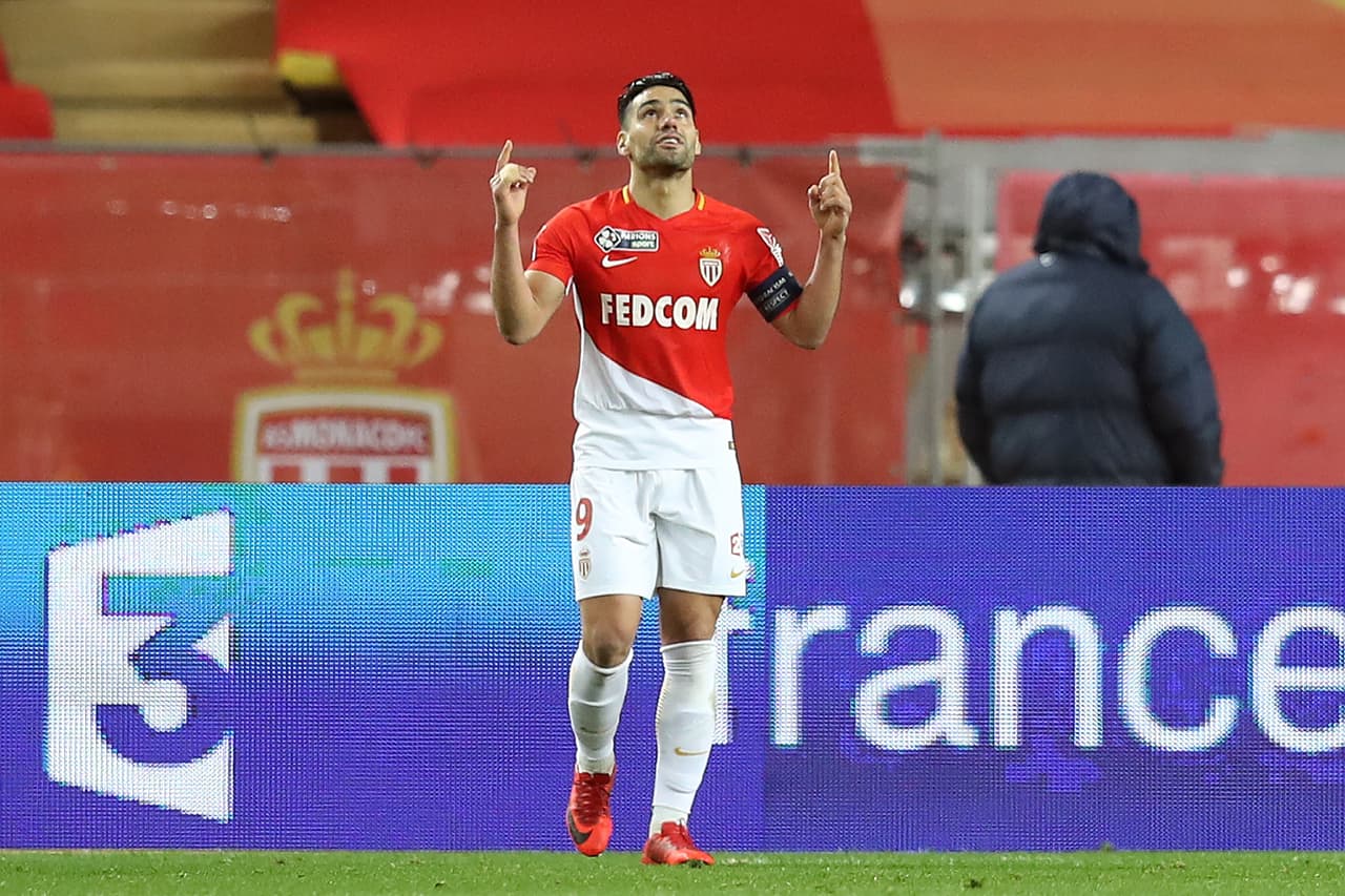 Monaco's Colombian forward Radamel Falcao celebrates after scoring goal during the French League Cup semi-final football match between Monaco and Montpellier at the Louis II stadium in Monaco on January 31, 2018. / AFP PHOTO / VALERY HACHE (Photo credit should read VALERY HACHE/AFP/Getty Images)