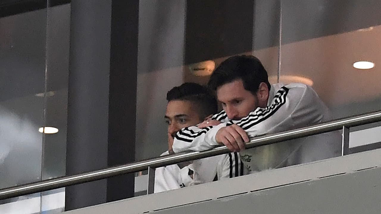 Argentina's forward Lionel Messi (R) reacts during a friendly football match between Spain and Argentina at the Wanda Metropolitano Stadium in Madrid on March 27, 2018. Messi was left out of Argentina's squad. He had been feeling pain in his hamstring and despite coach Jorge Sampaoli insisting the striker was fit, he did not even make the bench at the Wanda Metropolitano in Madrid. / AFP PHOTO / GABRIEL BOUYS (Photo credit should read GABRIEL BOUYS/AFP/Getty Images)