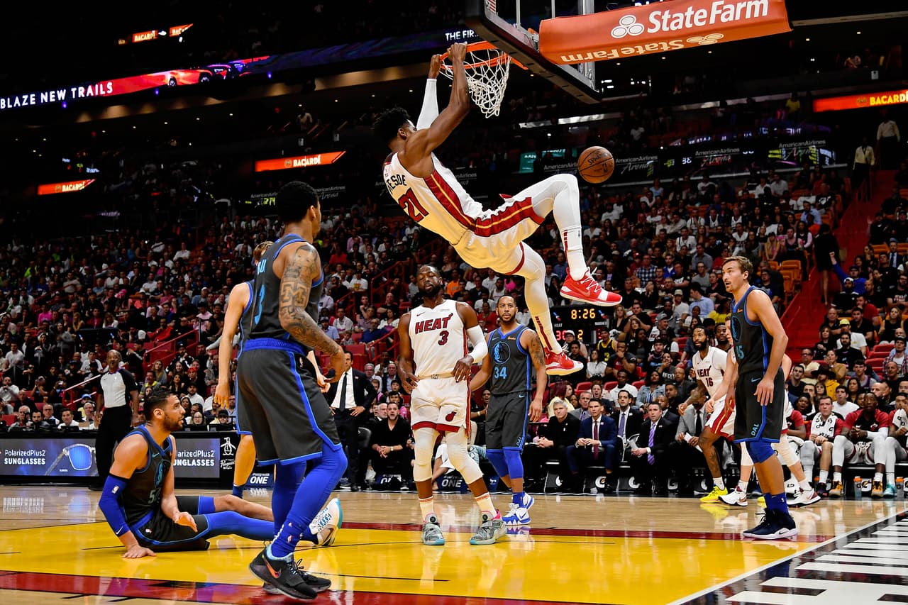 Mar 28, 2019; Miami, FL, USA; Miami Heat center Hassan Whiteside (21) dunks the ball against the Dallas Mavericks during the first half at American Airlines Arena. Mandatory Credit: Jasen Vinlove-USA TODAY Sports