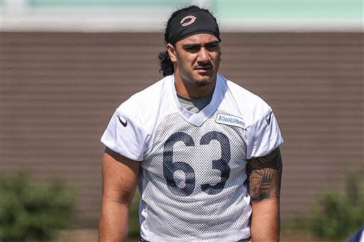 Desde la Universidad de Washington, el apoyador John Timu en su primera año en la Liga (AP-NFL).