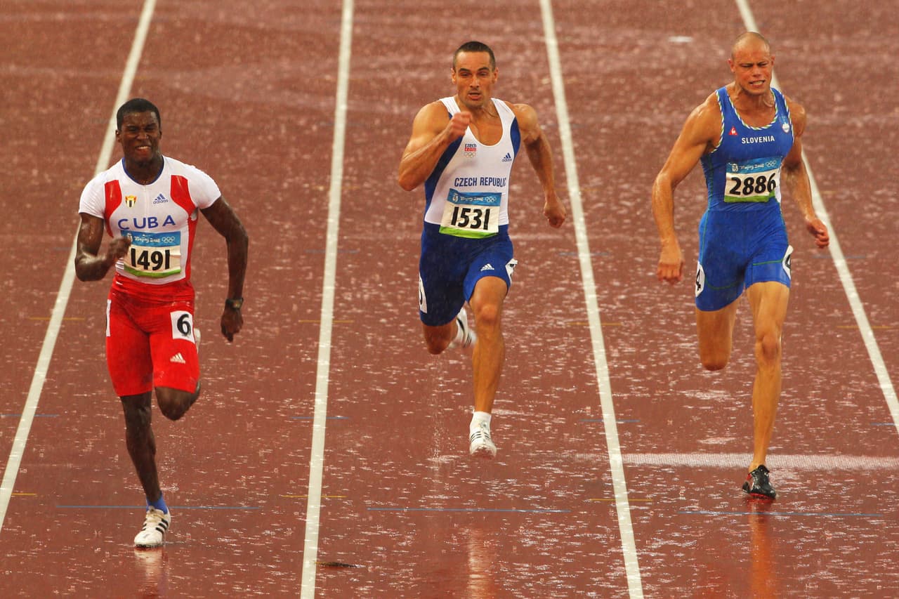 BEIJING - AUGUST 21: (L-R) Wilfredo Martinez of Cuba, Roman Sebrle of Czech Republic and Damjan Sitar of Slovenia compete in the Men's Decathlon 100m Final held at the National Stadium during Day 13 of the Beijing 2008 Olympic Games on August 21, 2008 in Beijing, China. (Photo by Stu Forster/Getty Images)