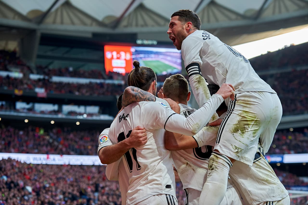 Gareth Bale of Real Madrid celebrates after scoring his sides first goal whit Toni Kroos,Sergio Ramos and Sergio Reguilon during the week 23 of La Liga match between Atletico Madrid and Real Madrid at Wanda Metropolitno stadium on Febreary 09 2019, in Madrid, Spain . (Photo by Jose Breton/NurPhoto via Getty Images)