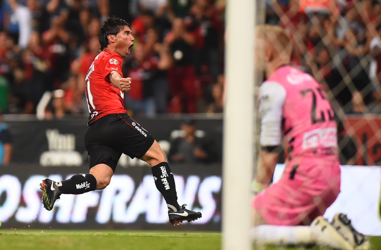 Matias Alustiza of Atlas celebrates after scoring against Leon during their Mexican Clausura football tournament match at Jalisco stadium in Guadalajara, Mexico, on February 25, 2017. / AFP / Hector GUERRERO (Photo credit should read HECTOR GUERRERO/AFP/Getty Images)