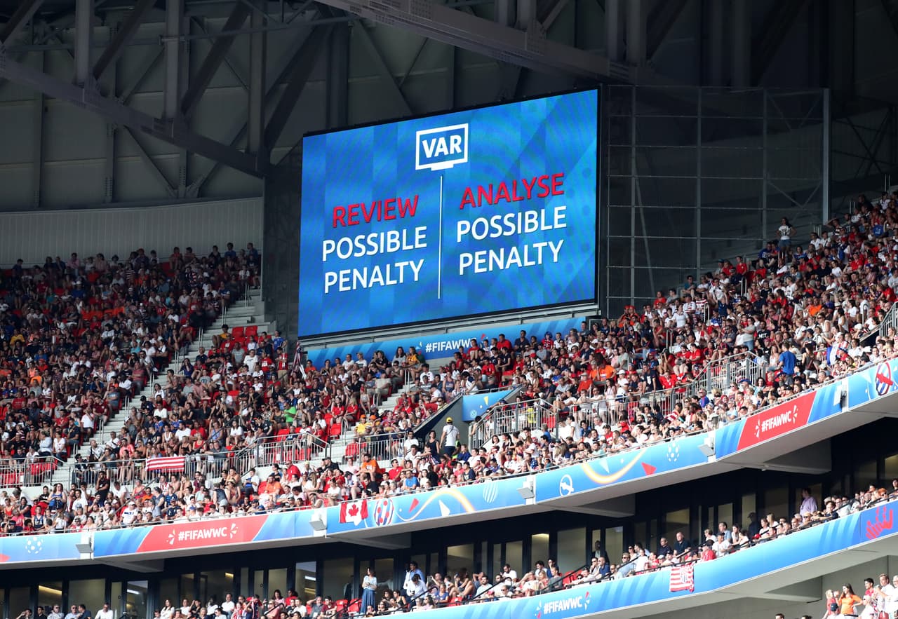 LYON, FRANCE - JULY 07: The big screen shows information during a VAR penalty review during the 2019 FIFA Women's World Cup France Final match between The United States of America and The Netherlands at Stade de Lyon on July 07, 2019 in Lyon, France. (Photo by Alex Grimm/Getty Images)
