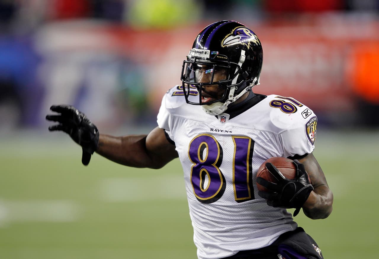 Baltimore Ravens wide receiver Anquan Boldin (81) catches a pass good for a first down at the New England Patriots 23 yard line with 51 seconds left in the fourth quarter during the AFC Championship NFL football game against the New England Patriots on Sunday, January 22, 2012 in Foxborough, Massachusetts. The Patriots won the game 23-20. (AP Photo/Paul Spinelli)