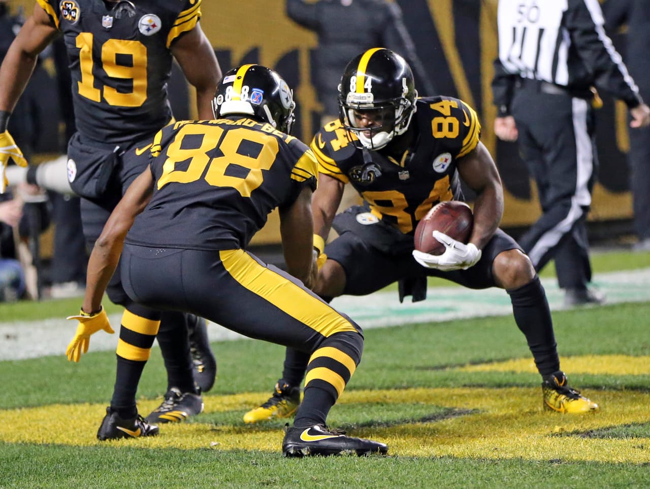 Pittsburgh Steelers wide receiver Antonio Brown (84) celebrates with Darrius Heyward-Bey (88) after catching a touchdown pass from quarterback Ben Roethlisberger during the first half of an NFL football game against the Tennessee Titans in Pittsburgh, Thursday, Nov. 16, 2017. (AP Photo/Keith Srakocic)