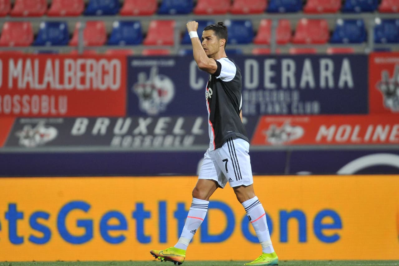 BOLOGNA, ITALY - JUNE 22: Cristiano Ronaldo of Juventus celebrates after scoring the opening goal during the Serie A match between Bologna FC and Juventus at Stadio Renato Dall'Ara on June 22, 2020 in Bologna, Italy. (Photo by Mario Carlini / Iguana Press/Getty Images)