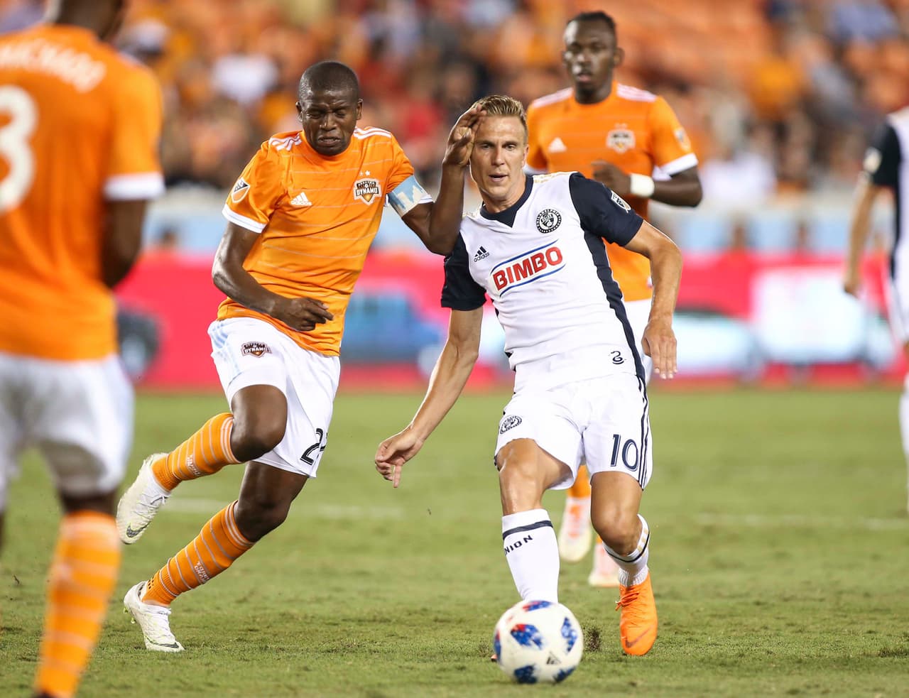 Jul 25, 2018; Houston, TX, USA; Philadelphia Union midfielder Borek Dockal (10) passes the ball as Houston Dynamo midfielder Boniek Garcia (27) defends during the second half at BBVA Compass Stadium. Mandatory Credit: Troy Taormina-USA TODAY Sports