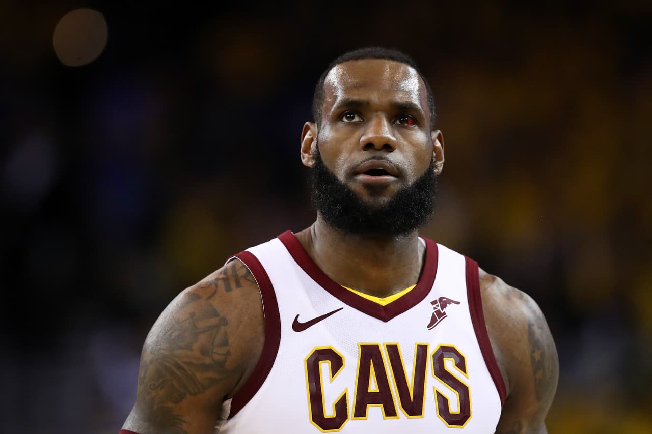 OAKLAND, CA - JUNE 03: LeBron James #23 of the Cleveland Cavaliers reacts against the Golden State Warriors in Game 2 of the 2018 NBA Finals at ORACLE Arena on June 3, 2018 in Oakland, California. NOTE TO USER: User expressly acknowledges and agrees that, by downloading and or using this photograph, User is consenting to the terms and conditions of the Getty Images License Agreement. (Photo by Ezra Shaw/Getty Images)