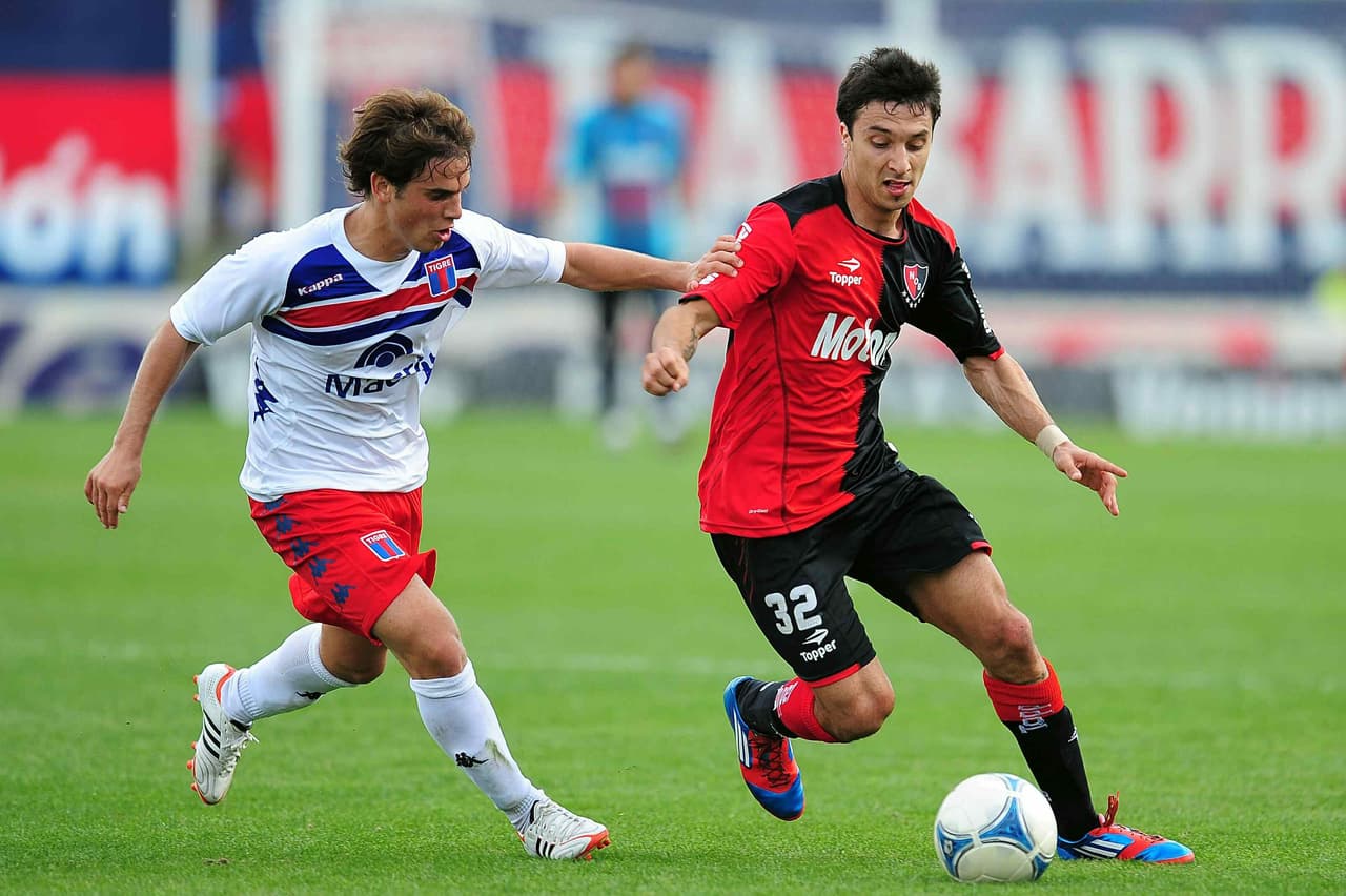 Tras un breve paso por el fútbol de Oriente Medio, regresó al Newell's de Gerardo Martino para hacerse figura importante en la Copa Libertadores 2013.