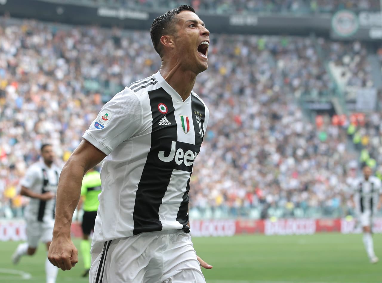 TURIN, ITALY - SEPTEMBER 16: Cristiano Ronaldo of Juventus FC celebrates after scoring the opening goal during the serie A match between Juventus and US Sassuolo at Allianz Stadium on September 16, 2018 in Turin, Italy. (Photo by Emilio Andreoli/Getty Images)